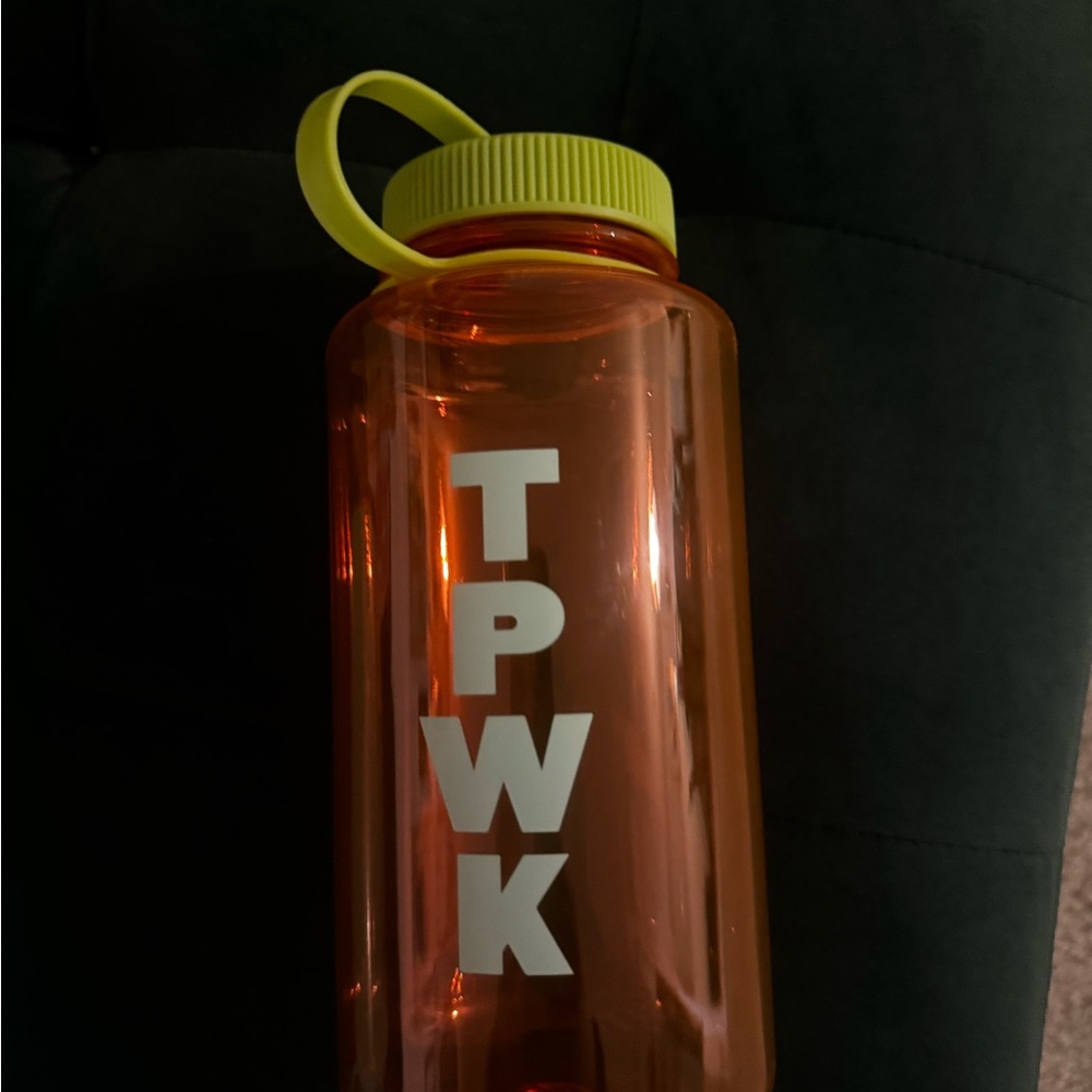Orange Water Bottle with Yellow Lid
